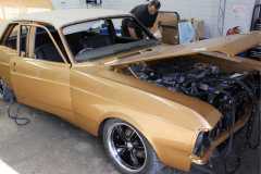 gold-ford-hood-up